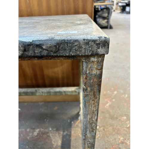 131 - A mid 20th century steel industrial table - approx. 69cm high x 46cm wide x 76cm long