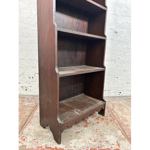 17 - An early 20th century carved oak four tier waterfall bookcase - approx. 116cm high x 61cm wide x 25c... 