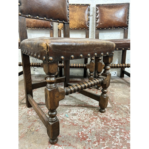 18 - Four Cromwellian style oak and brown leather dining chairs