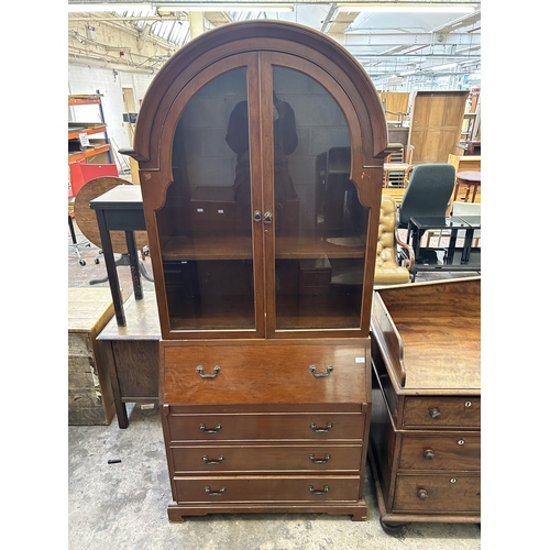 20 - A mahogany bureau bookcase with arched top and bracket supports - approx. 214cm high x 91cm wide x 4... 