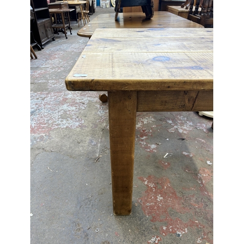 38 - A solid pine rectangular farmhouse dining table - approx. 80cm high x 88cm wide x 122cm long