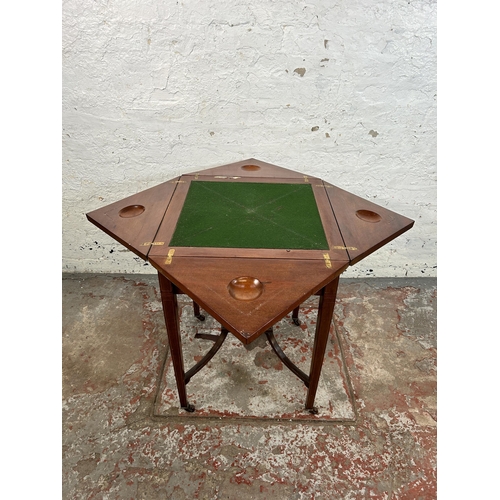 38B - An Edwardian inlaid mahogany folding envelope card table - approx. 70cm high x 102cm wide x 102cm lo... 