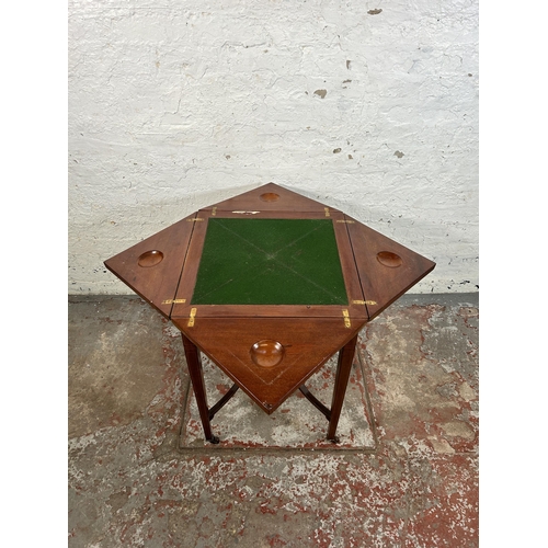 38B - An Edwardian inlaid mahogany folding envelope card table - approx. 70cm high x 102cm wide x 102cm lo... 