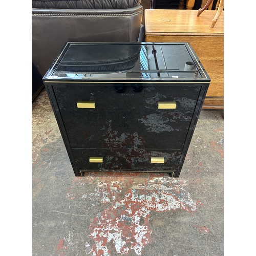 44 - A Pierre Vandel of Paris black lacquered metal and glass top media cabinet - approx. 74cm high x 70c... 