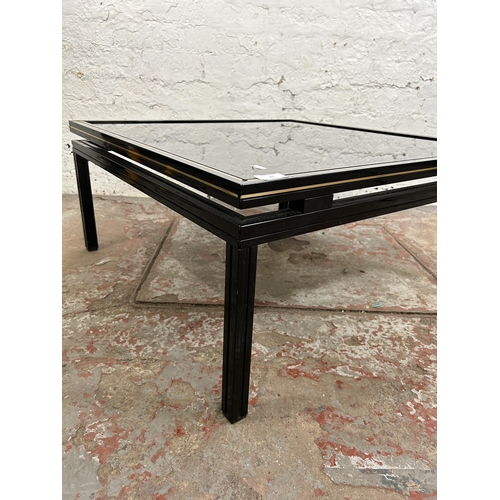 45 - A Pierre Vandel of Paris black lacquered metal and glass top coffee table - approx. 33m high x 72cm ... 