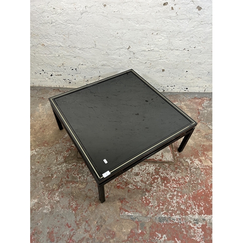 45 - A Pierre Vandel of Paris black lacquered metal and glass top coffee table - approx. 33m high x 72cm ... 