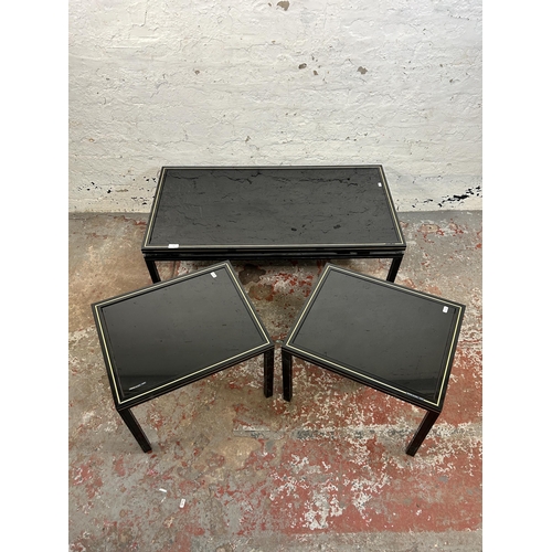 47 - Three Pierre Vandel of Paris black lacquered metal and glass top occasional tables - approx. 34cm hi... 