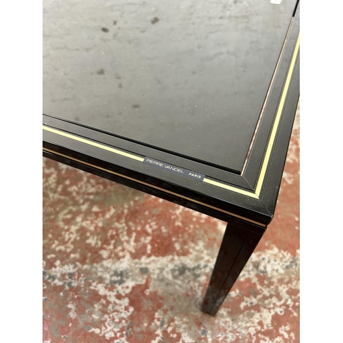 47 - Three Pierre Vandel of Paris black lacquered metal and glass top occasional tables - approx. 34cm hi... 