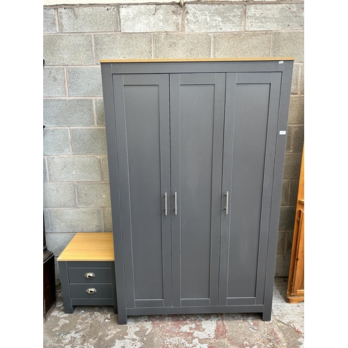 5 - A Lancaster grey laminate and oak effect two piece bedroom suite comprising triple wardrobe - approx... 