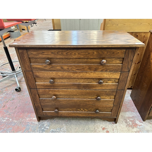 50 - An oak chest of drawers - approx. 83cm high x 85cm wide x 41cm deep