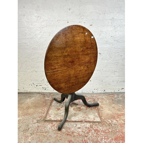 51 - A Georgian oak circular tilt top tripod occasional table - approx. 116cm high x 85cm diameter