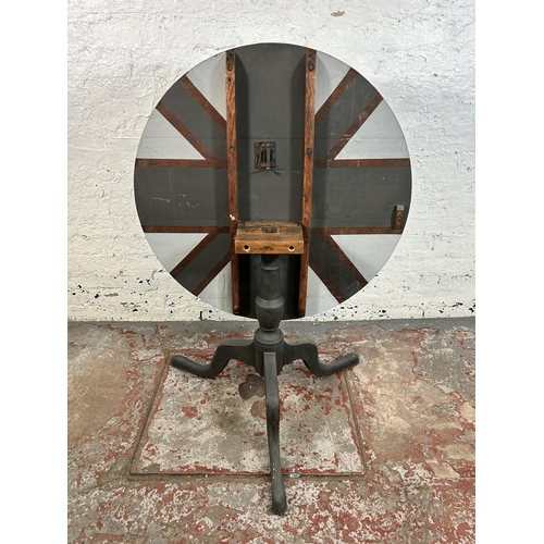 51 - A Georgian oak circular tilt top tripod occasional table - approx. 116cm high x 85cm diameter