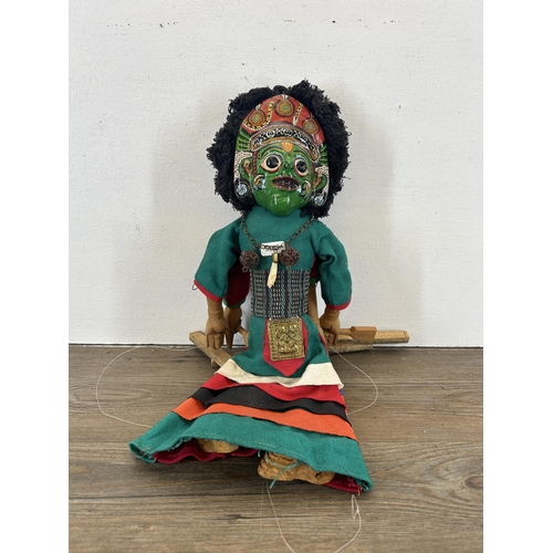 601 - A vintage Nepalese hand painted two faced Ganesh marionette - approx. 43cm high long