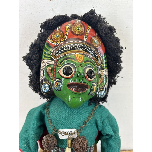 601 - A vintage Nepalese hand painted two faced Ganesh marionette - approx. 43cm high long