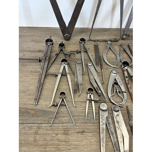 606 - A collection of vintage engineers tools to include Moore & Wright flat leg divider, Moore & Wright i... 