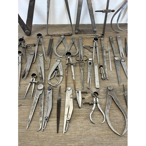 606 - A collection of vintage engineers tools to include Moore & Wright flat leg divider, Moore & Wright i... 