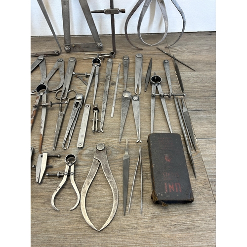 606 - A collection of vintage engineers tools to include Moore & Wright flat leg divider, Moore & Wright i... 