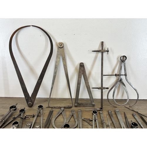 606 - A collection of vintage engineers tools to include Moore & Wright flat leg divider, Moore & Wright i... 