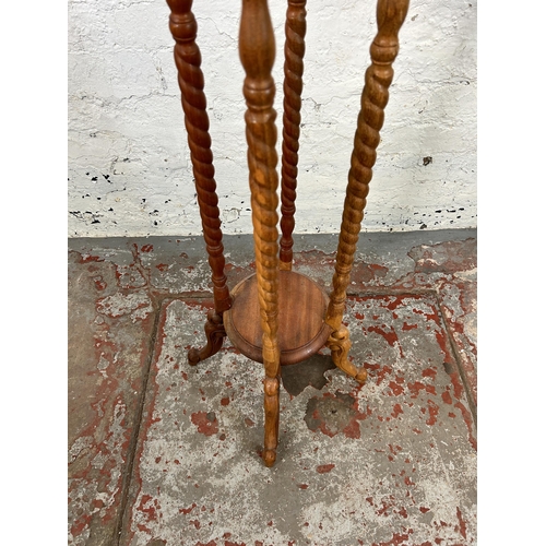 60B - A 19th century style mahogany barley twist jardinière stand - approx. 103cm high x 28 diameter