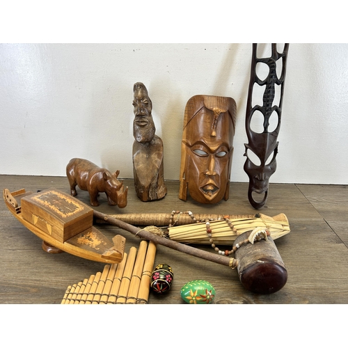 613 - A collection of treenware to include African Tribal style carved hardwood wall mask, African Tribal ... 