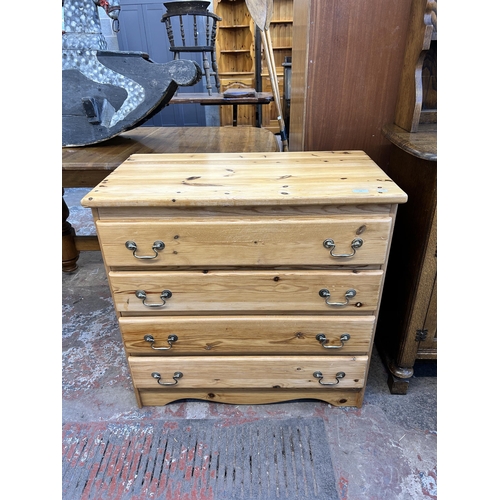 64 - A pine chest of drawers - approx. 82cm high x 84cm wide x 45cm deep