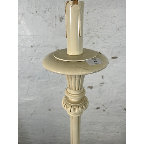 66 - A French style white painted standard lamp with circular base - approx. 151cm high