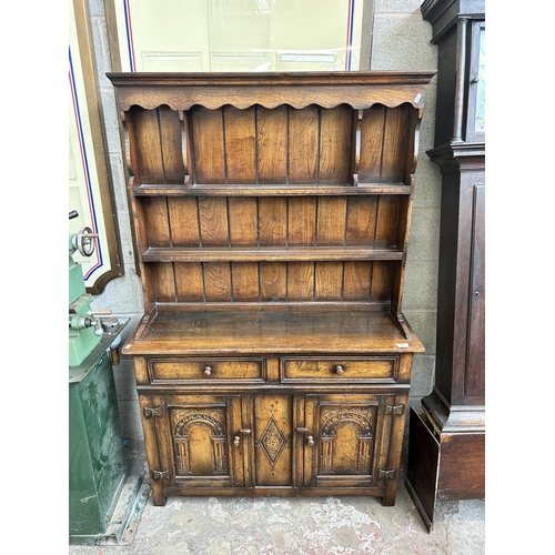 7 - A Titchmarsh & Goodwin style carved oak Welsh dresser - approx. 166cm high x 107cm wide x 33cm deep