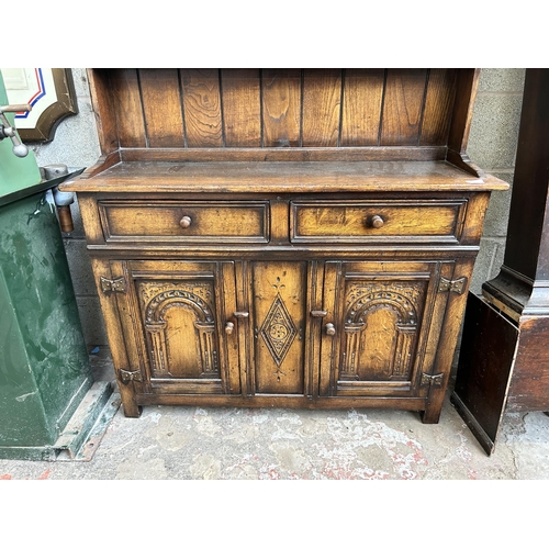 7 - A Titchmarsh & Goodwin style carved oak Welsh dresser - approx. 166cm high x 107cm wide x 33cm deep