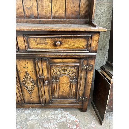 7 - A Titchmarsh & Goodwin style carved oak Welsh dresser - approx. 166cm high x 107cm wide x 33cm deep