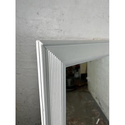 78 - A white painted framed wall mirror - approx. 135cm high x 104 wide