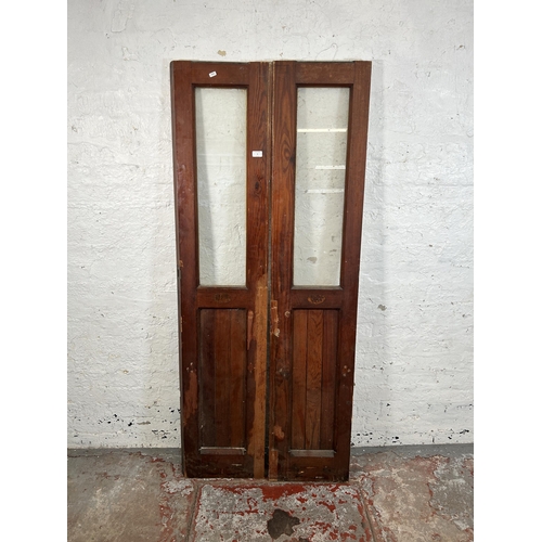 8 - A pair of Victorian pitch pine glazed doors - approx. 178cm high x 38cm wide