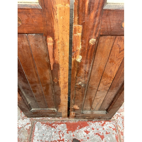 8 - A pair of Victorian pitch pine glazed doors - approx. 178cm high x 38cm wide