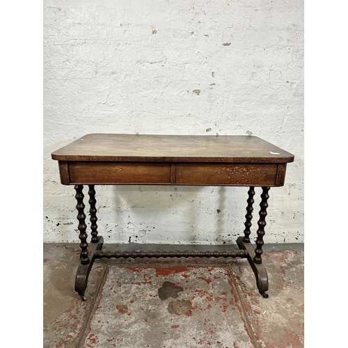 88 - A Victorian mahogany two drawer library table on bobbin turned supports - approx. 75cm high x 99cm w... 