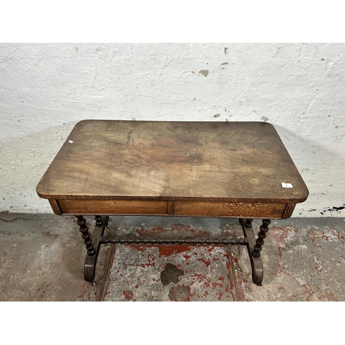 88 - A Victorian mahogany two drawer library table on bobbin turned supports - approx. 75cm high x 99cm w... 