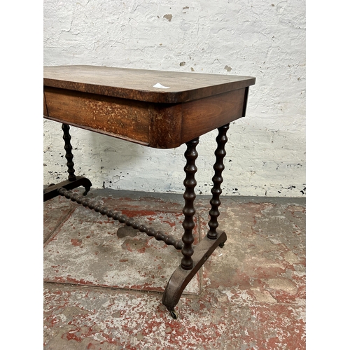 88 - A Victorian mahogany two drawer library table on bobbin turned supports - approx. 75cm high x 99cm w... 