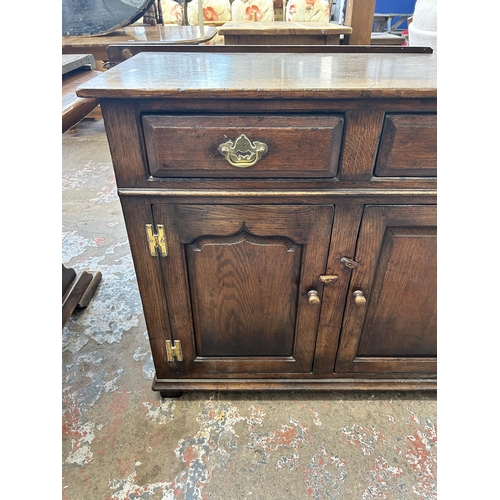 9 - A Titchmarsh & Goodwin solid oak sideboard - approx. 84cm high x 139cm wide x 45cm deep