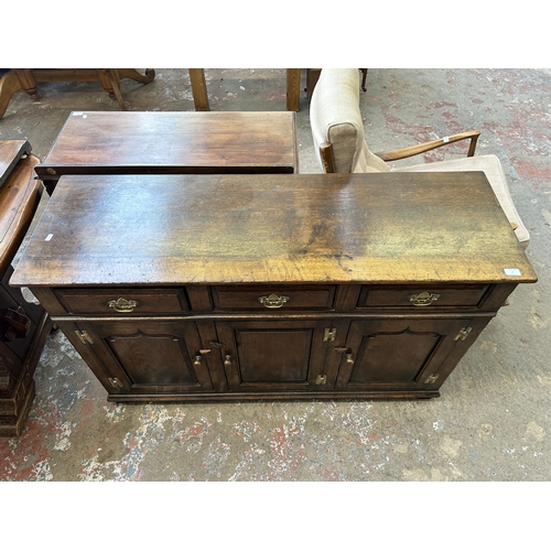 9 - A Titchmarsh & Goodwin solid oak sideboard - approx. 84cm high x 139cm wide x 45cm deep