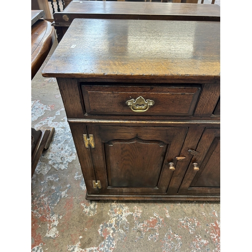 9 - A Titchmarsh & Goodwin solid oak sideboard - approx. 84cm high x 139cm wide x 45cm deep