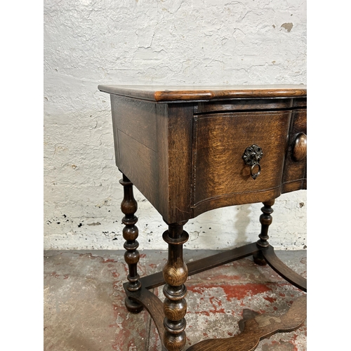 92 - An early 20th century oak lowboy/side table - approx. 80cm high x 74cm wide x 45cm deep