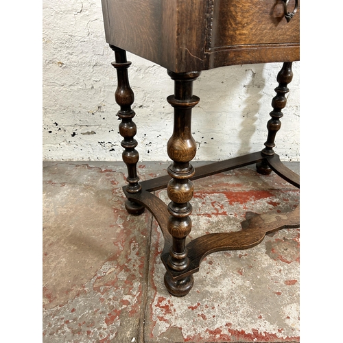 92 - An early 20th century oak lowboy/side table - approx. 80cm high x 74cm wide x 45cm deep