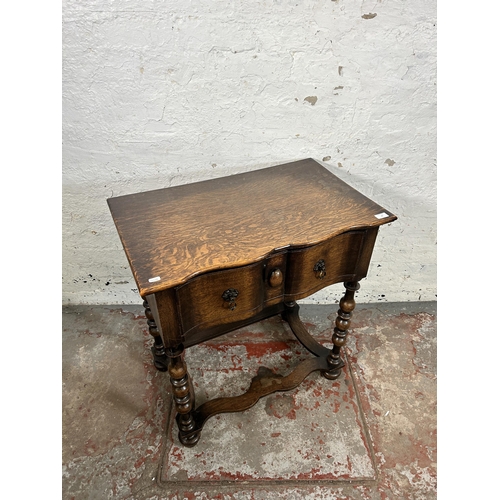 92 - An early 20th century oak lowboy/side table - approx. 80cm high x 74cm wide x 45cm deep