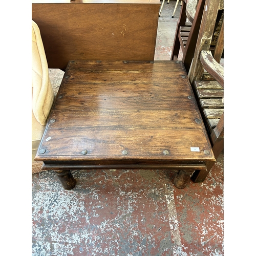 95 - An Indian sheesham wood coffee table - approx. 40cm high x 80cm wide x 80cm deep