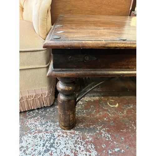 95 - An Indian sheesham wood coffee table - approx. 40cm high x 80cm wide x 80cm deep