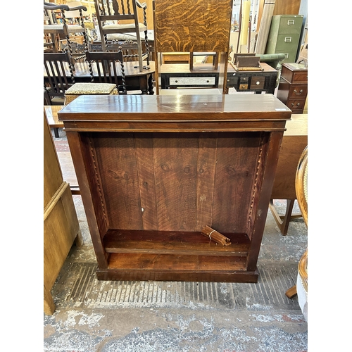 97 - A late 19th/early 20th century stained pine four tier bookcase - approx. 100cm high x 90cm wide x 26... 