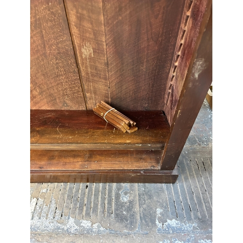 97 - A late 19th/early 20th century stained pine four tier bookcase - approx. 100cm high x 90cm wide x 26... 