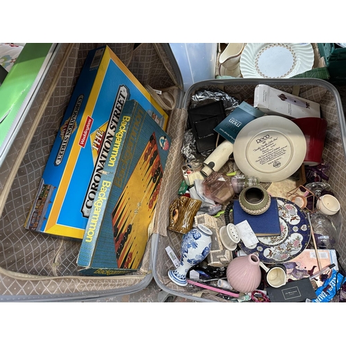 970 - Three boxes and two suitcases containing treenware, ceramics, board games, Sherborne stool etc.