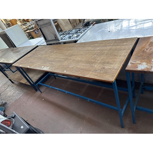 813 - A cast metal two tier workbench with pine top - approx. 93.5cm high x 203cm long x 72cm deep