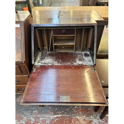 144 - An Edwardian mahogany bureau on bracket supports and casters - approx. 101cm high x 54cm wide x 38cm... 