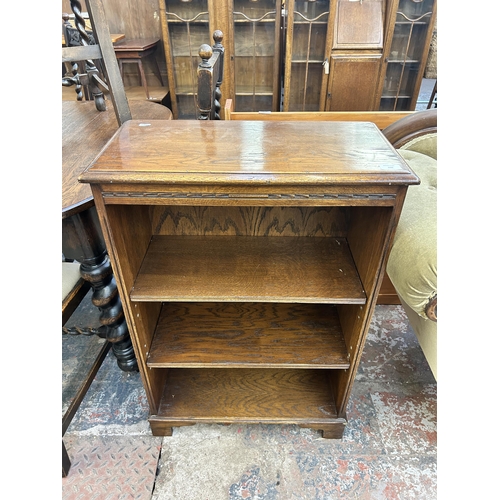 150 - A Titchmarsh & Goodwin style carved oak three tier bookcase - approx. 91cm high x 61cm wide x 30cm d... 