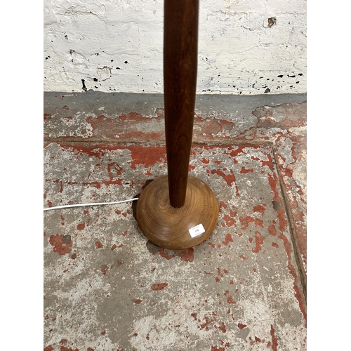 176 - A mid 20th century teak standard lamp - approx. 121cm high